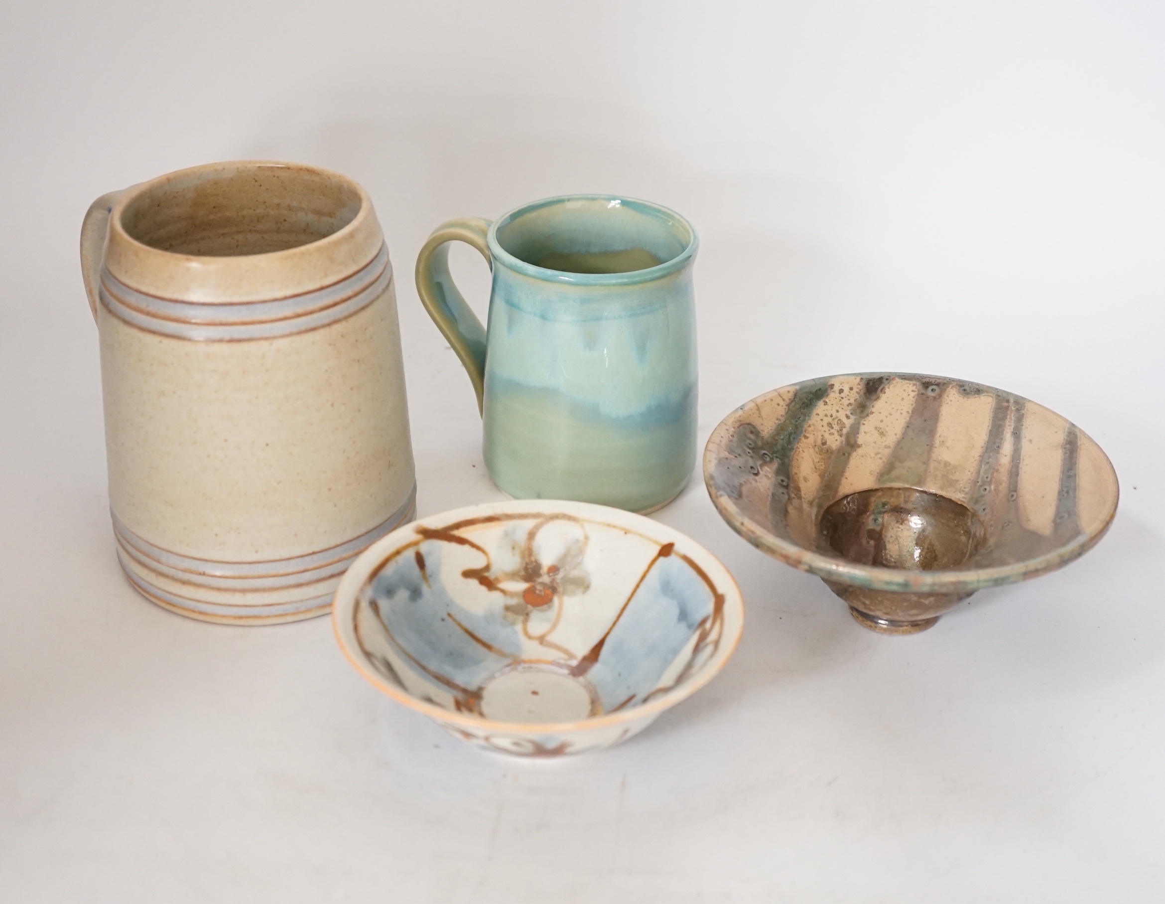 A group of European and Japanese studio pottery dishes, bowls and vases including a Boscastle R Irving plate, largest 26cm in diameter (17)